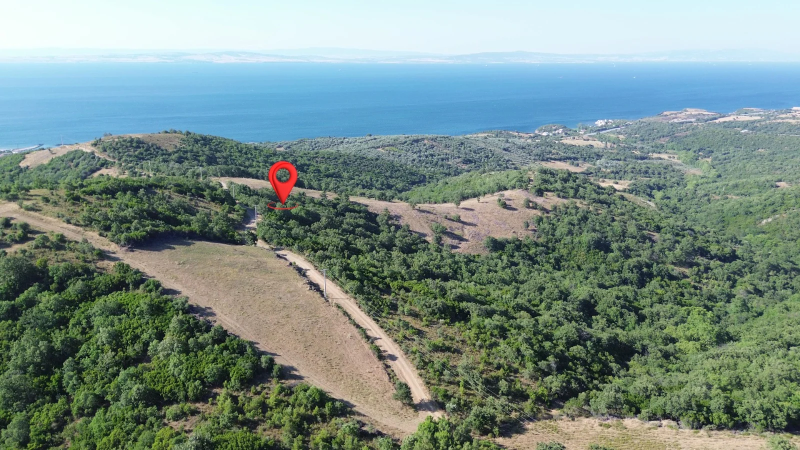 ÇANAKKALE LAPSEKİ ŞEVKETİYE KÖYÜ’NDE KADASRAL YOLA CEPHELİ, YATIRIMLIK 3.883 m² SATILIK ARAZİ
